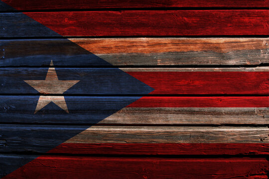 3D Flag of Puerto Rico on a old wood wall background.