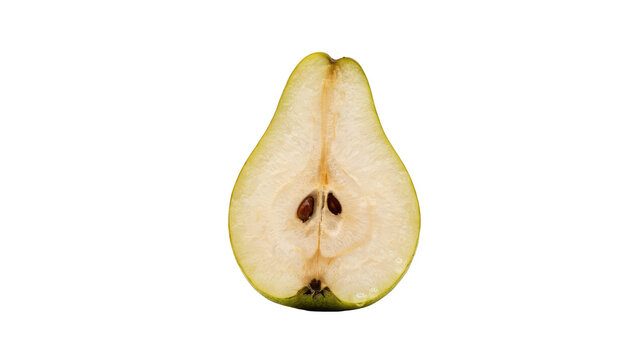 A single vertical half of a fresh green pear displaying the core and seeds, captured against a solid black background, for food