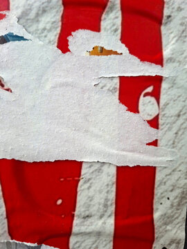 Torn and ripped street poster background, messy old paper texture