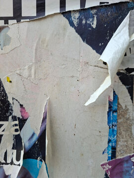 Torn and ripped street poster background, messy old paper texture