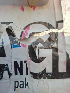 Torn and ripped street poster background, messy old paper texture
