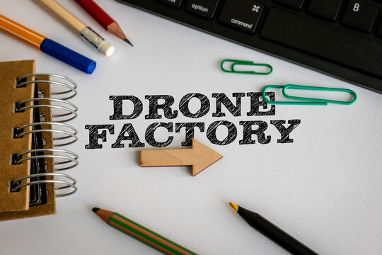 DRONE FACTORY Concept with Directional Arrow and Creative Office Supplies