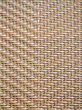 Wide view of natural woven rattan pattern background.