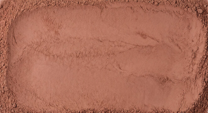 Top view of finely milled terracotta colored dried madder root powder with smooth empty center space