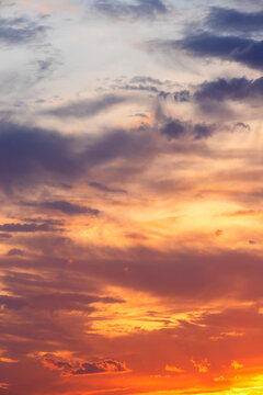 Dramatic sunset sky glows with intense colors
