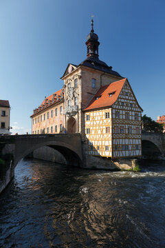 Germany, Bavaria, Bamberg, View of old town hall with regnitz river