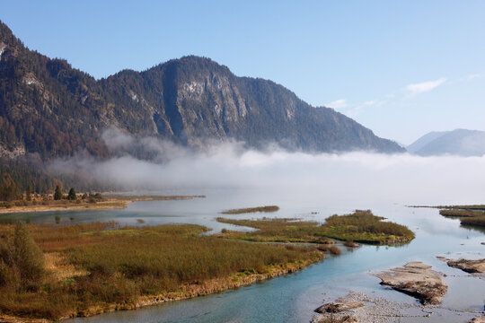 Germany, Bavaria, Upper Bavaria, View of Sylvensteinpeicher with lake in fog