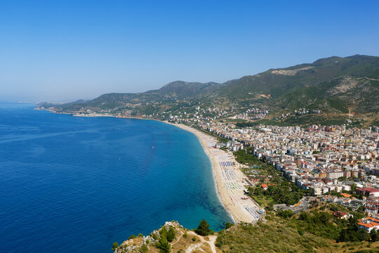 Turkey, Alanya, View of Cleopatra Beach and castle in background