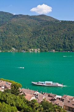 Excursion boat sailing on Lake Lugano at Morcote Ticino Switzerland
