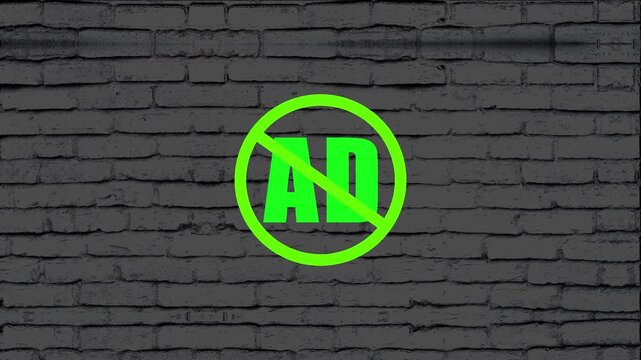 Advertisement prohibition sign glows bright neon green against a textured dark grey brick wall background to signal a public policy or a clear restriction on promotional materials in this urban.