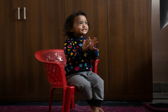 young child watching television