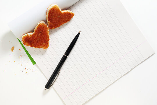 Heart Shaped Toast on Notebook