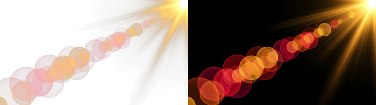 Sun flare with bright golden light rays and colorful optical lens bokeh