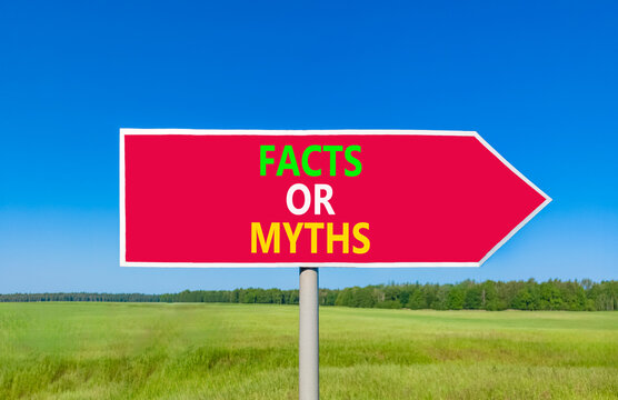 Facts or myths words symbol. Concept words Myths or Facts on beautiful red road sign. Beautiful blue sky green grass background. Business and facts or myths concept. Copy space.