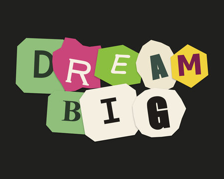 Dream big motivational quote made with colorful paper cutout letters on a dark background