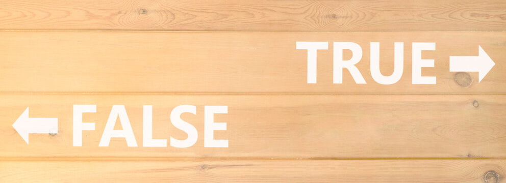True or false symbol. Concept word True or False on beautiful wooden wall. Beautiful wooden wall background. Business and true or false concept. Copy space.