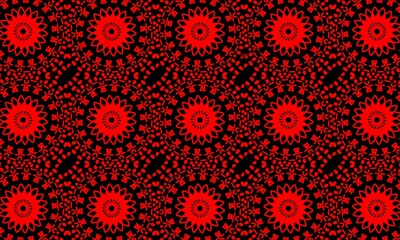 Seamless ethnic pattern with bright red floral mandalas and ornate circular motifs on a dark black background © MOCHFARH