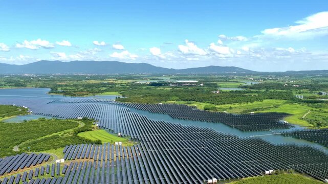 Large floating solar panels on water, innovative clean energy project.