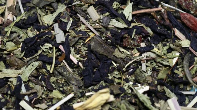 Close up of a pile of dried leaves, perfect for fall or nature-themed designs. Rotating in a circle
