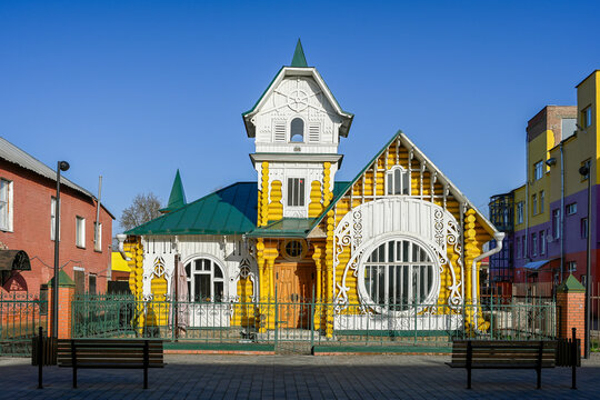 Yellow wooden mansion of the Luzhin merchants in Kimry town, Tver region of Russia