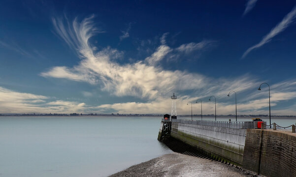 Jetty and lighthouse in Cancale, brittany, france