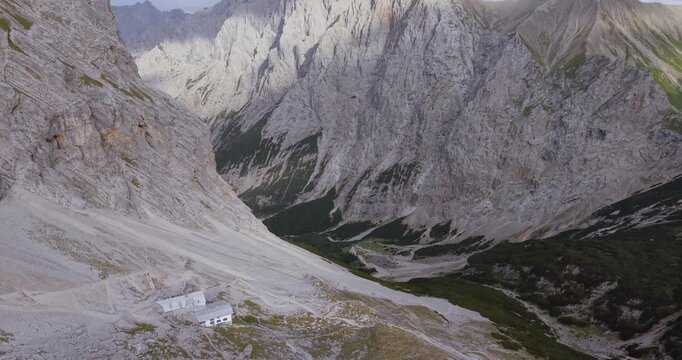Drone view of Knorrhutte below dramatic limestone peaks near Zugspitze