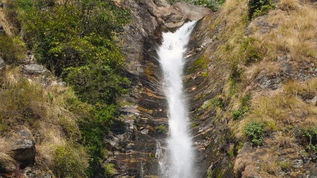 Close View of Birthi Waterfall Cascading Down Rocky Cliff Near Munsiyari, Uttarakhand