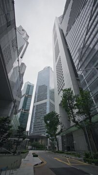 Contemporary eco architecture with modern office skyscrapers in Singapore city financial center creating a vibrant business skyline and urban landscape across Asia