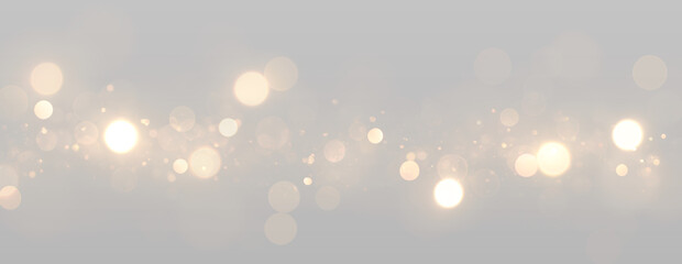 Glowing bokeh lights with bright circles and sparkling particles. © Emryx