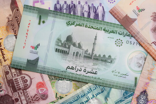 Close-up view of polymer and paper United Arab Emirates dirham banknotes