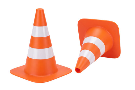 Two orange traffic cones with white stripes one standing and one tipped over