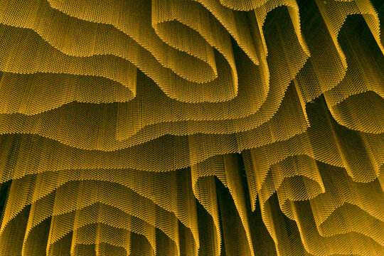 Abstract background, curves and spirals of mesh curtain, interior design element of office building