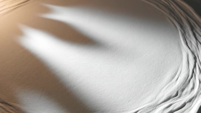 Close-up view of pouring white liquid creating swirling patterns.