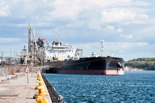 industrial crude oil fuel tanker ship at terminal industrial port, Tanker ship unloading crude oil, Industry refinery Fredericia, Denmark