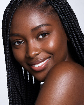 Woman box braids clear radiant skin beauty portrait