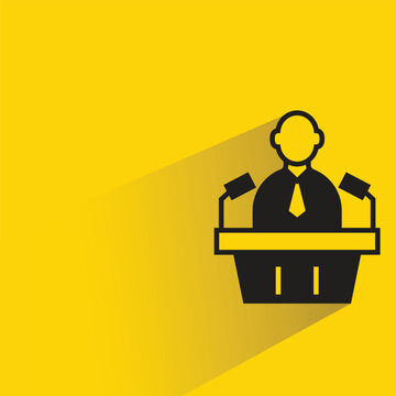 speaker on podium icon with drop shadow on yellow background