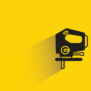 electric hand saw icon with shadow on yellow background