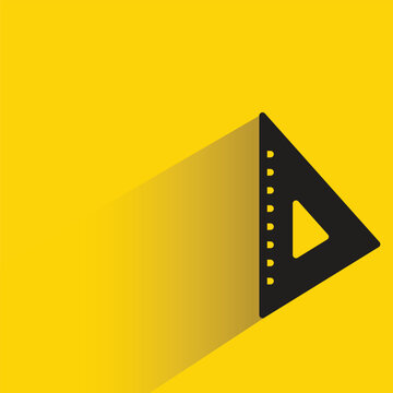 triangle ruler icon with shadow on yellow background
