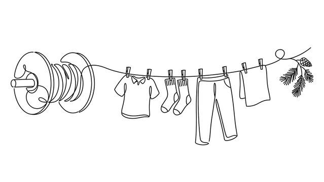 Clothesline with baby clothes on white background.