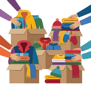 Donations packed into cardboard boxes by volunteers showing community support and charity work for winter clothing drives and humanitarian aid distribution events.
