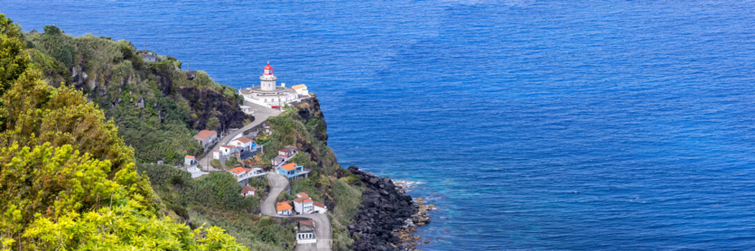 Azores panoramic view of Farol do Arnel lighthouse landscape nature on Sao Miguel island in Portugal