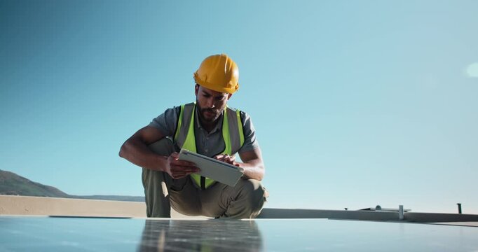 Rooftop, man and tablet for solar panel inspection, check diagnostics or log maintenance records. Clean energy, technician or typing on tech for PV performance, installation quality control or space