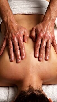 Soothing Massage Therapy Session: Relaxation Techniques for Back Tension Relief and Holistic Well-Being in a Calming Environment