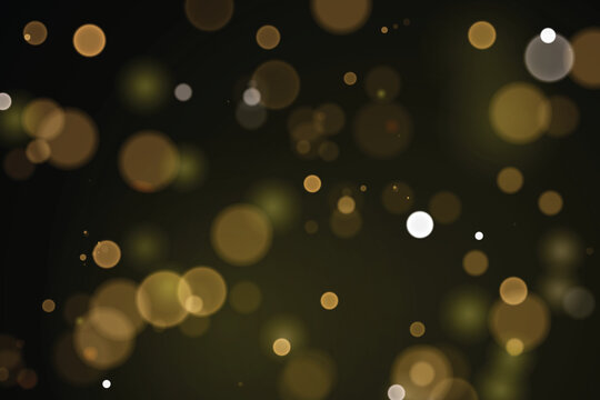 Scattered warm golden bokeh circles and softly glowing light spots floating across a black background, suitable for festive overlays, luxury graphics, celebration banners, digital compositions, invita