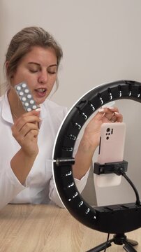 A gynecologist demonstrates contraceptives live on air and compares condoms to birth control pills.