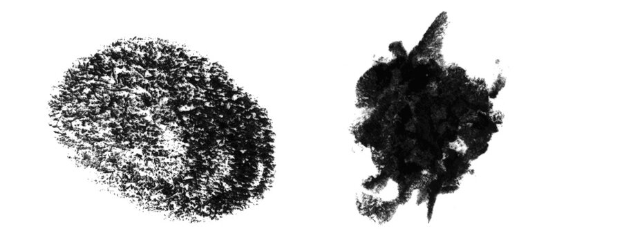 Two artistic black ink splash shapes with rough texture and messy paint splatter design elements Background