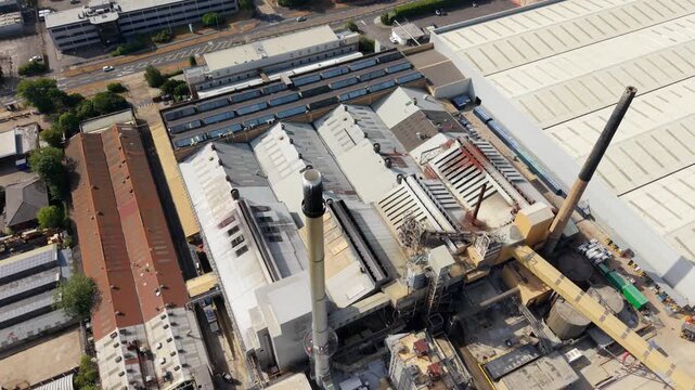 Aerial view of cryogenic liquid nitrogen tanks and ambient air vaporizers at an industrial facility in Harlow, England, United Kingdom.