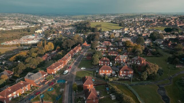 Aerial view of quiet residential neighborhood at golden hour