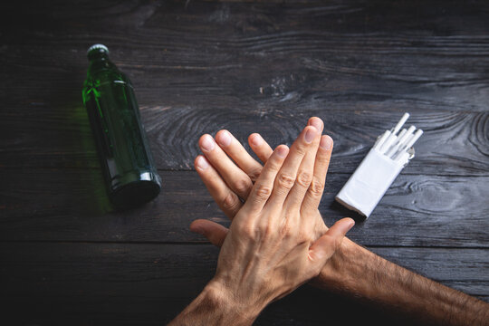 Caucasian man reject cigarettes. No smoking
