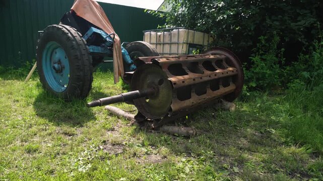 old red combine harvester repair threshing machine replacement of whips on the drum welding work to improve the efficiency of the unit